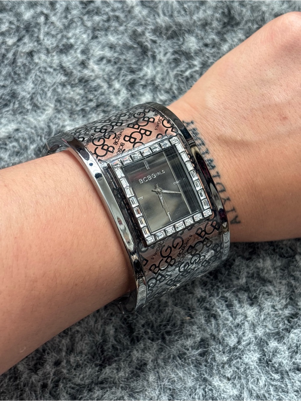 BCBG Girls cuff watch with black & silver details
